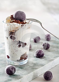 Ice cream with cherry berries marble countertop background