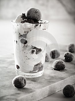 Ice cream with cherry berries on marble countertop background