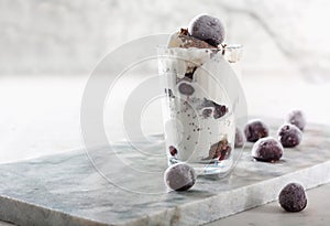 Ice cream with cherry berries on marble countertop background
