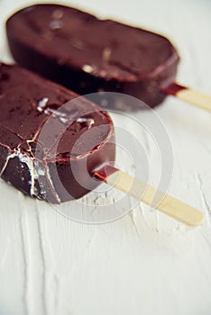 Ice cream coated with chocolate glaze, top view