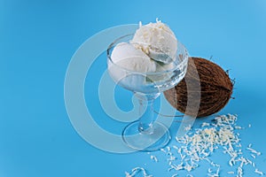Ice cream with coconut over a blue background