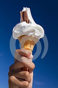 Ice Cream Cone with Chocolate Flake and Blue Sky