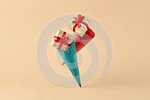 Ice cream cone with falling gift box