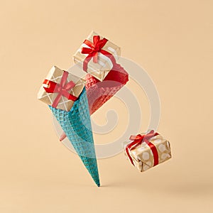 Ice cream cone with falling gift box