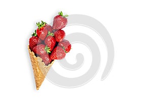 Ice cream cone filled with ripe strawberries isolated on white background. Waffle cone with ripe strawberries. Banner