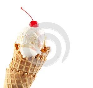 Ice cream cone with maraschino cherry