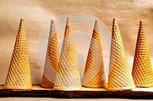 Ice cream cones against beige background