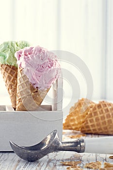 Ice cream cones with an old metal scoop