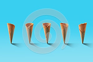 Ice cream cones pattern. Turquoise background. Sweet, summer and empty concept.