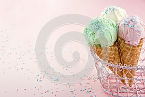 Ice cream cones in on pink background