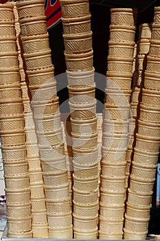 Ice cream cones stacked outside.