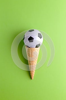 Ice cream cornet with soccer ball