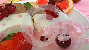 Ice cream with fruits cool cherry berries slow-motion shooting