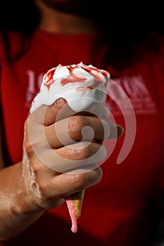 Ice cream in the hand photo