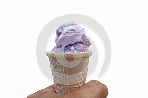 Ice cream in the hand on a white background