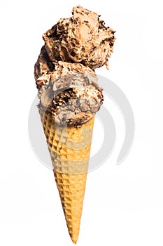 Real comestible ice cream:  hazelnut and chocolate ice cream cornet isolated on white background photo