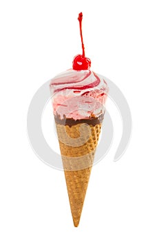 Ice cream with maraschino cherry in waffle cone