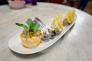 Ice-cream passion fruit sherbet with fruit slices