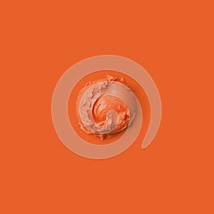 Ice cream scoop on a orange background