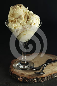 Ice cream scoops with chocolate in an ice cream bowl