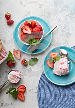 Ice cream Scoops of delicious ice-cream and strawberry on white background. Scoops of delicious ice-cream and strawberry on white