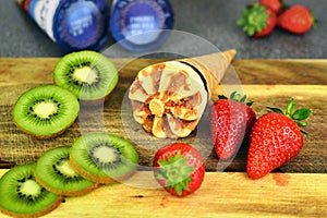 Ice cream, strawberries and kiwis