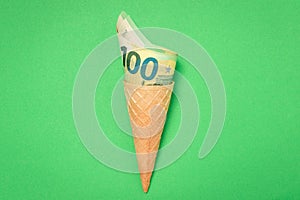 Ice cream wafer cone with euro banknotes