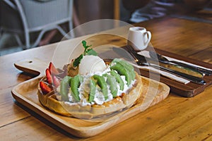 Ice cream and wafers.topped with fruit