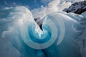 Ice crevice, Fox Glacier, New Zealand. photo