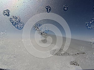 Ice crystals on an airplane window