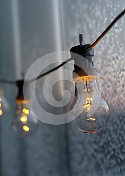 Ice Crystals on a Frozen Glass and a Lamp in Front of Them