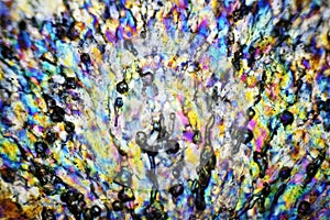 Ice crystals melting under polarized light microscope