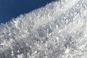 Ice crystals on snow at city of Davos during winter, Switzerland