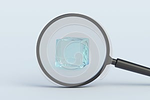 Ice cube behind magnifying glass