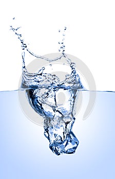 Ice cube splashing into water isolated on white