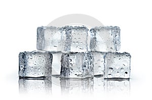 Ice cube and water drops on white background