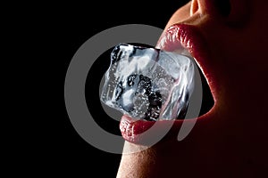 Ice cube in woman's mouth