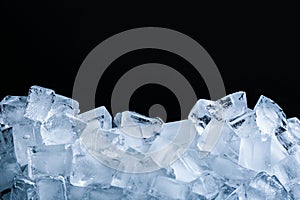 Ice cubes on black background, closeup