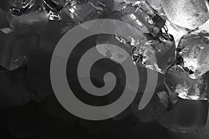 Ice cubes on black background