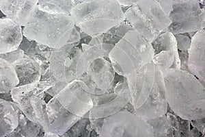 Ice cubes in a bucket of cold storage.