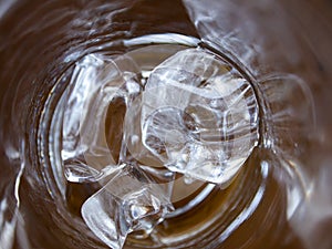 Ice cubes in cold water glass, Close up & Macro shot, Selective focus, Healthy Drink concept