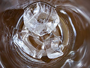 Ice cubes in cold water glass, Close up & Macro shot, Selective focus, Healthy Drink concept