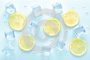 Ice cubes and fresh lemon slice with water drops on blue background