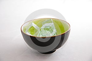 Ice cubes in a Green Bowl