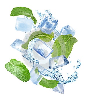 Ice cubes and green mint leaves with water splash on white background