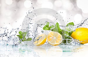 Ice cubes, mint leaves with lemons