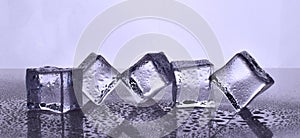 Ice cubes with water drops