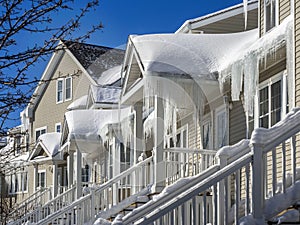 Ice dams and snow on roof and gutters