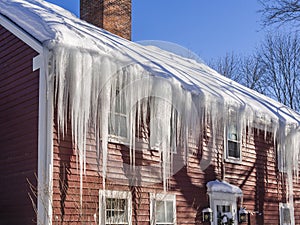 Ice dams and snow on roof and gutters