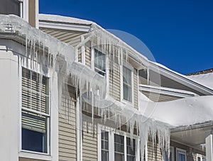 Ice dams and snow on roof and gutters